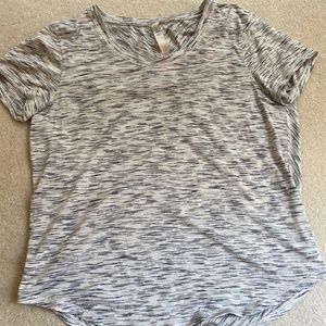 Lululemon crewneck athletic t-shirt with cap sleeves and curved hem